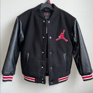 Jordan Black Jacket with Red Logo and Leather Sleeves